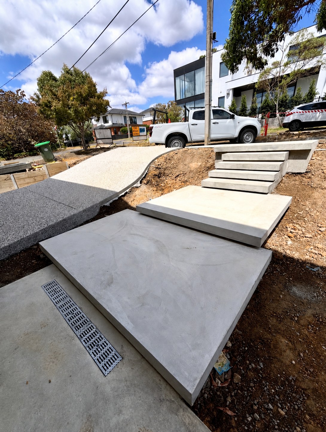 Concrete path steps and drainage channel